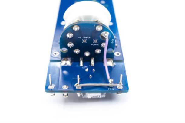 2 cm wire bridging the BG and BP turrets on the D-12 PCB.